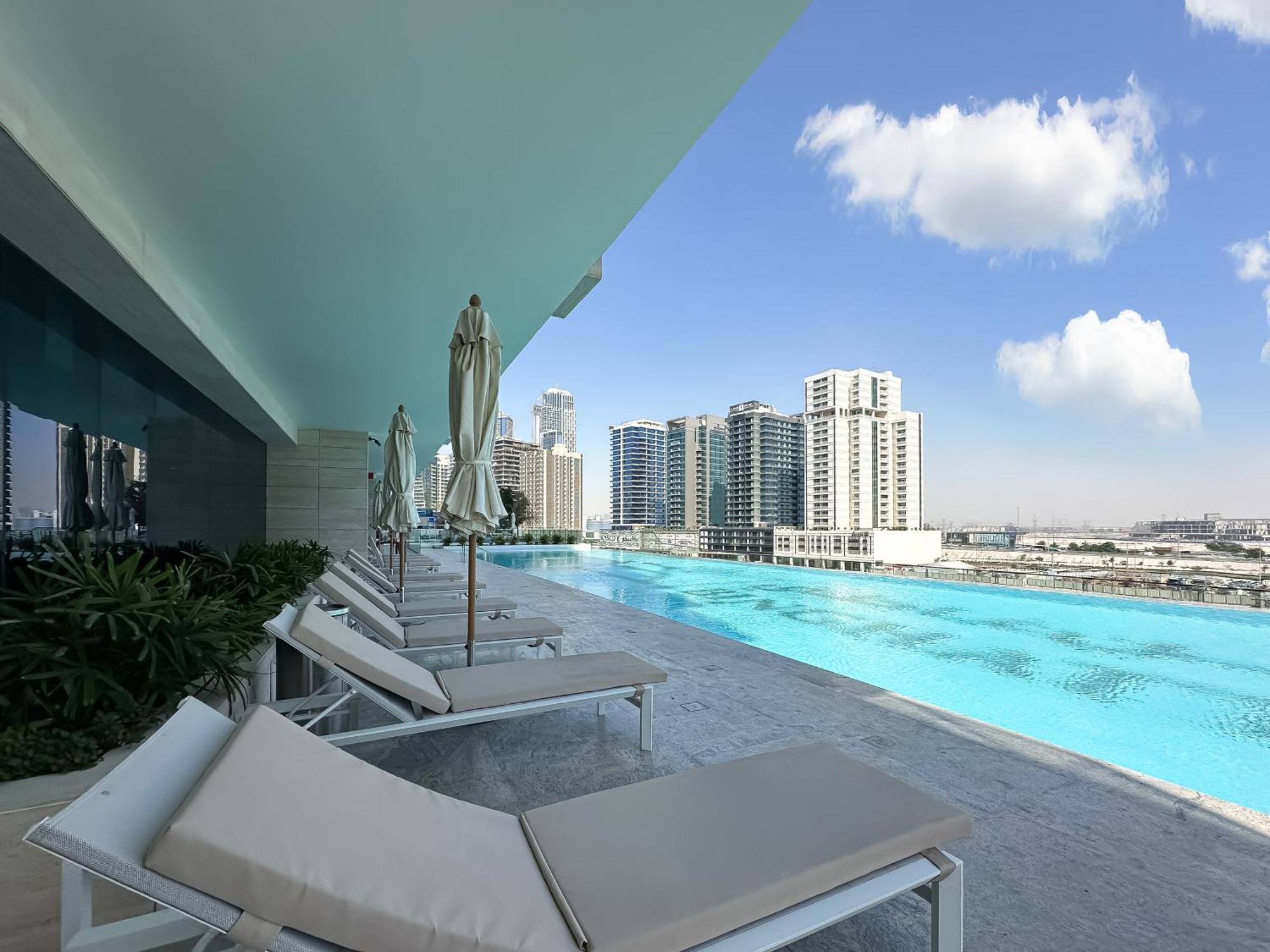 Canal View Escape With Stunning Pool Vibes Dubai